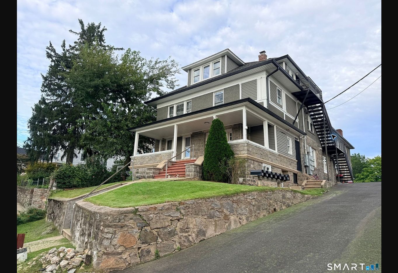 Second view of the multifamily property at 213 Ely Avenue