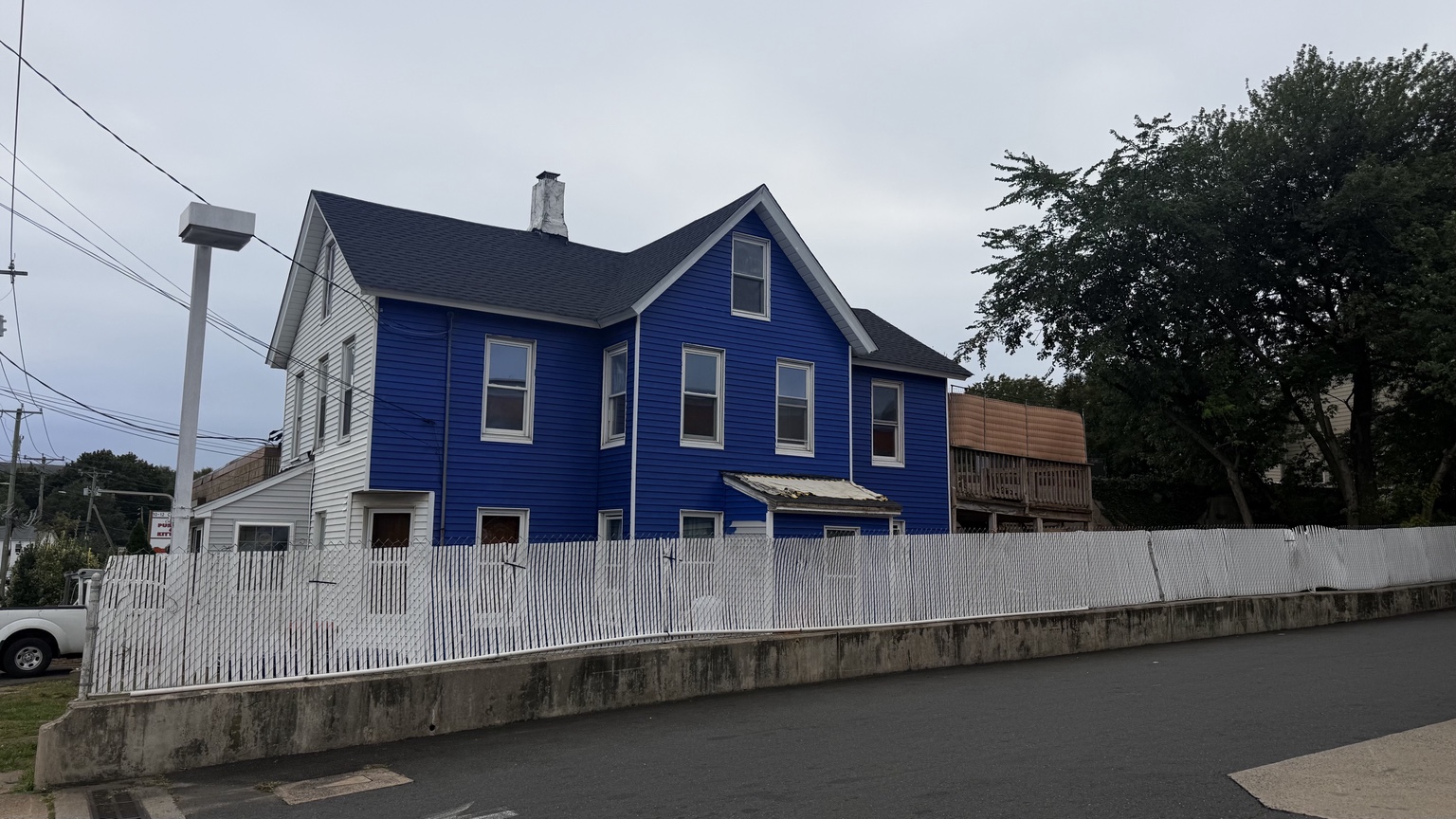 Exterior of the two-family home at 8 Cross Street in Norwalk, Connecticut